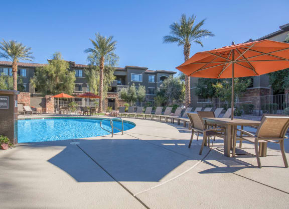 Pool Side Relaxing Area With Sundeck at The Passage Apartments by Picerne, Henderson, NV, 89014