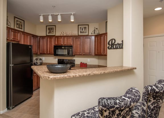 Spacious Kitchen With Pantry Cabinet at The Passage Apartments by Picerne, Henderson, Nevada