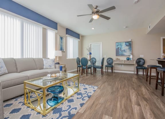 Living Room With Dining Area at The Passage Apartments by Picerne, Henderson, 89014