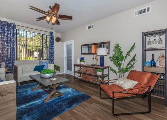 Large Living Room With Ceramic Tile Flooring at The Preserve by Picerne, N Las Vegas, NV