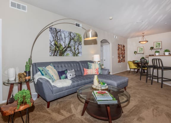 Living Room With Kitchen View at The Presidio by Picerne, N Las Vegas