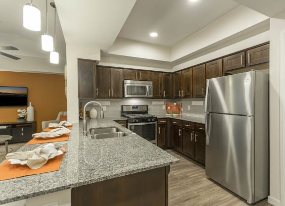 Kitchen with appliances , wooden cabinets and wooden floor at The View at Horizon Ridge, Nevada, 89012