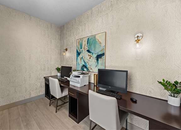 Community business center with computers and a printer at The Fairways by Picerne Apartments, Las Vegas, NV