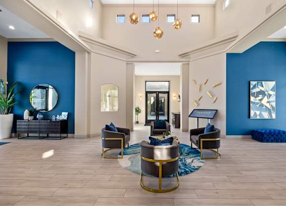 Office foyer with seating at The Fairways by Picerne Apartments, Las Vegas 89141
