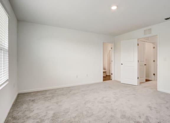 Spacious and empty master bedroom at Beacon at Arbours in Ruskin, FL
