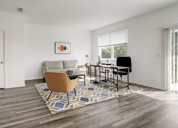 Stylishly decorated living room at Beacon at Arbours in Ruskin, FL