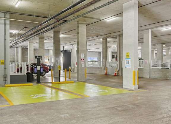 Property parking garage with EV charging stations at Blue Lagoon 7 in Miami, FL
