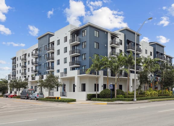 Side view of our beautiful apartment building at Bay Village 1 in Palmetto Bay, FL