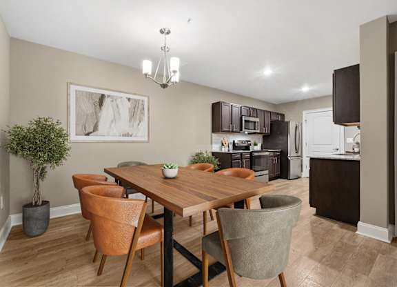 3 Bedroom Unit| Virtually Staged Dining Room at Capital Grand in Tallahassee, FL