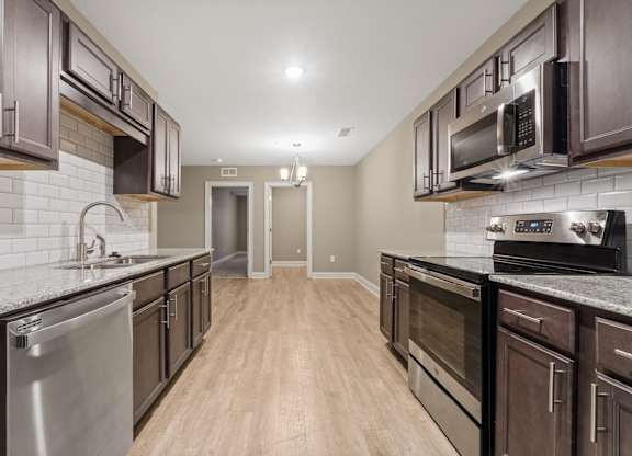 3 Bedroom Unit| Kitchen at Capital Grand in Tallahassee, FL