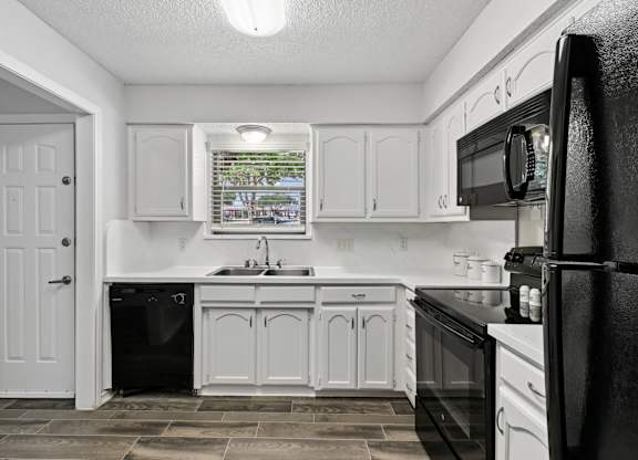 Model unit kitchen at Chisholm Place in Plano, TX