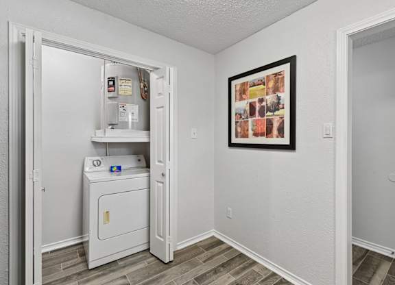 Model unit laundry at Chisholm Place in Plano, TX