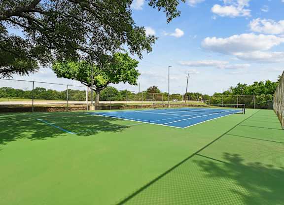 Tennis court at Chisholm Place in Plano, TX