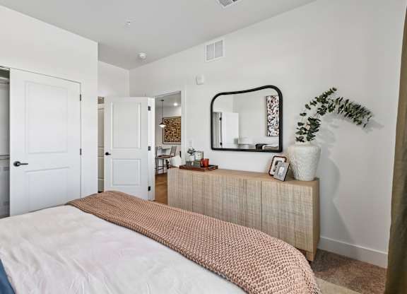 Model Unit bedroom in Chapel Park Apartments in Waco, TX
