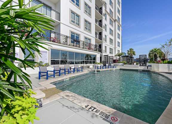 Our sparkling pool on the rooftop patio at Dominion Post Oak apartments in Houston, TX