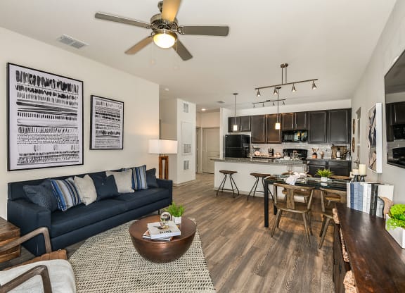 Model Living Room at  Dunedin Commons Apartment Homes in Dunedin, Florida, FL