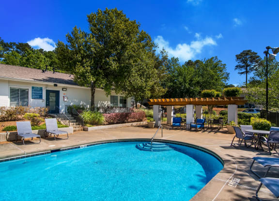 our apartments showcase an unique swimming pool at Dunwoody Pointe in Sandy Springs, GA