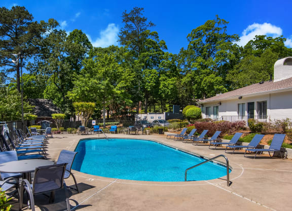 pool with trees at the background at Dunwoody Pointe in Sandy Springs, GA