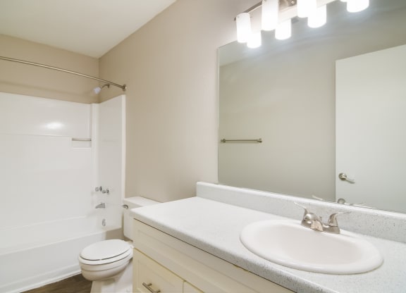 a bathroom with a sink and a toilet at Dunwoody Pointe in Sandy Springs, GA