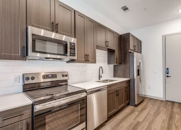 Spacious Kitchen with Contemporary Design at Era Apartment in Denton, TX
