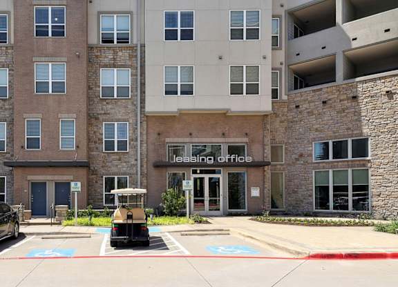 Entrance to leasing office at GreenVue apartments in Richardson, TX