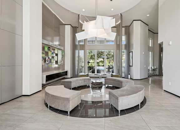 Lobby area with couches at GreenVue apartments in Richardson, TX