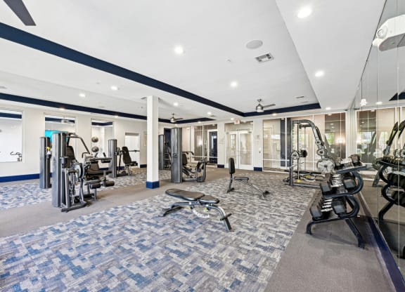 Modern fitness studio with state-of-the-art equipment at Harlow River Oaks apartments in Houston, TX