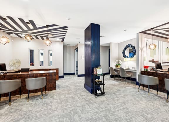 Elegant leasing office with sleek furniture and a welcoming ambiance at Harlow River Oaks apartments in Houston, TX