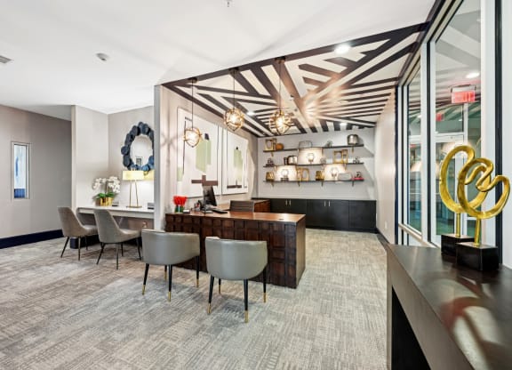 Welcoming leasing office with comfortable seating at Harlow River Oaks apartments in Houston, TX