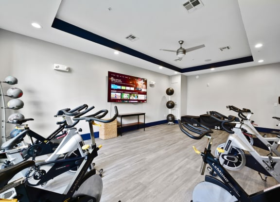 Spacious spin cycle studio for group cycling classes at Harlow River Oaks apartments in Houston, TX