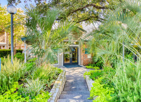 Front view of the leasing office at Hillside Creek Apartments in Austin, TX