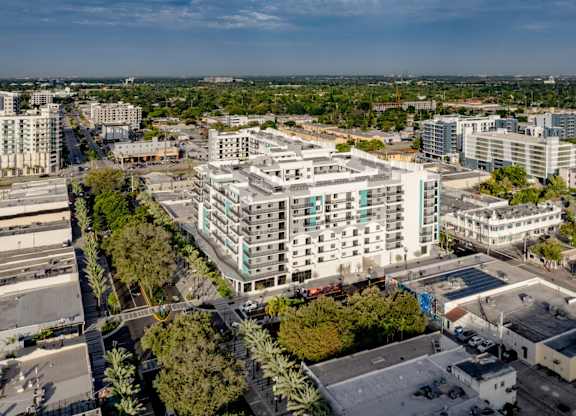 Aerial view of Hollywood Heights on the Boulevard Luxury Apartments in Hollywood, FL with lush greenery