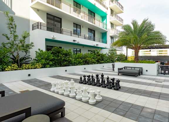 A giant chess set is set up on our courtyard at Hollywood Heights on the Boulevard Luxury Apartments in Hollywood, FL