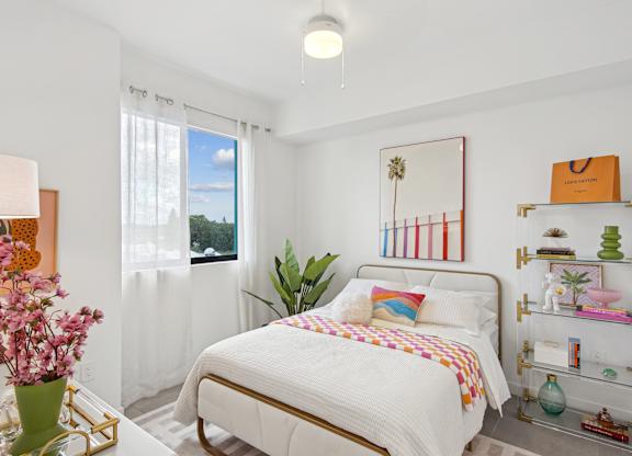 Second bedroom with a bed, nightstand in our 2-bedroom model at Hollywood Heights on the Boulevard Luxury Apartments in Hollywood, FL