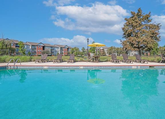 Inside the pool looking toward apartment buildings at Ultris Island Park in Shreveport, LA