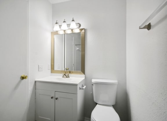 a bathroom with white cabinets at Johnston Creek Crossing in Charlotte, NC