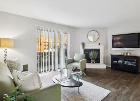 living room with a big window at Johnston Creek Crossing in Charlotte, NC