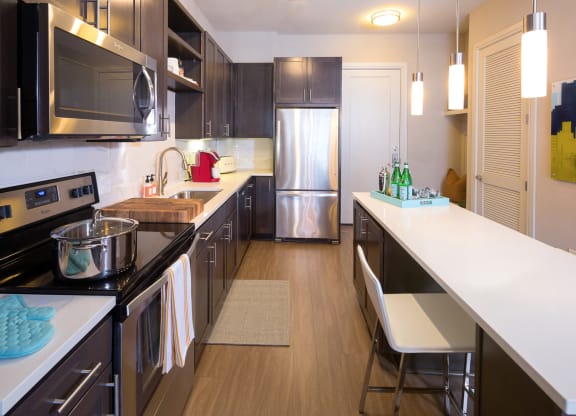 kitchen with wooden closets at Knox Heights in Dallas, TX