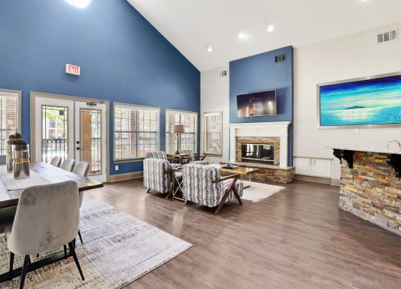 the reserve at bucklin hill clubhouse with fireplace and tv
