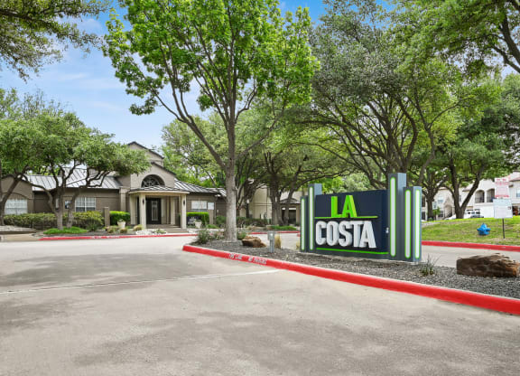 a building with a sign that says la costa