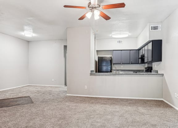 Spacious living room area at Laurels of Sendera apartments in Arlington, TX