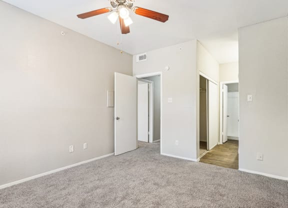 Comfortable bedroom with closet space at Laurels of Sendera apartments in Arlington, TX