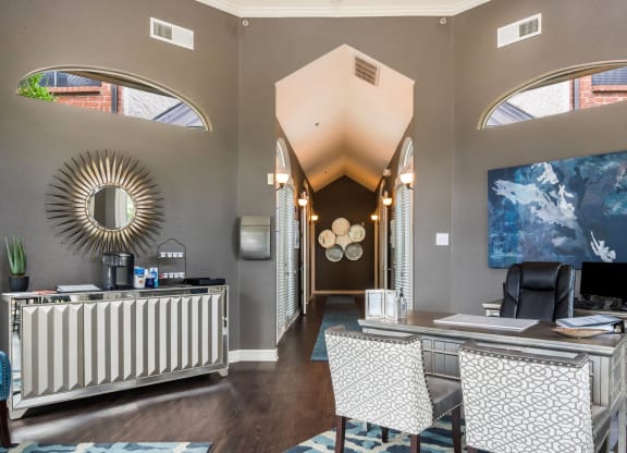 Interior of leasing office with coffee maker and office desk at Laurels of Sendera in Arlington TX