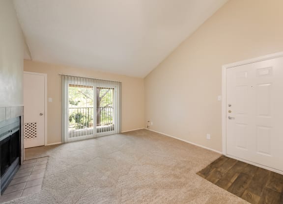 Model Living Room with Fireplace at Vista Crossing Apartments in San Antonio, TX
