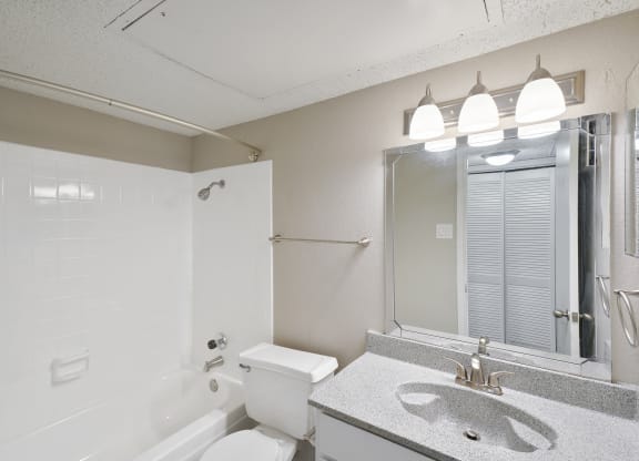 Unit Bathroom at Polaris Apartment Homes in Irving, Texas, TX