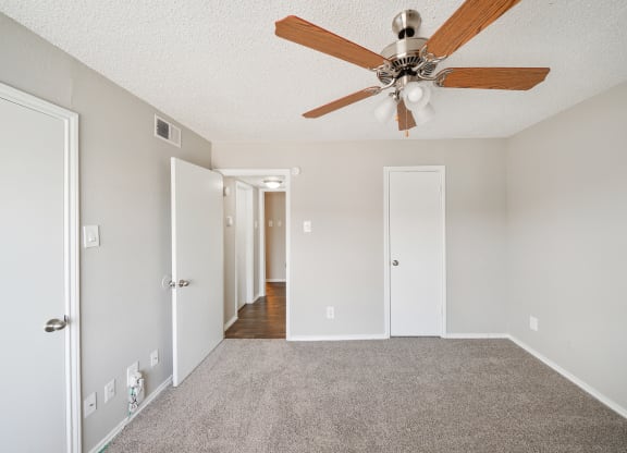 Bedroom with Ceiling Fan at Polaris Apartment Homes in Irving, Texas, TX