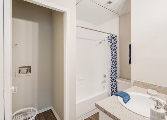 W/D Connections and Bathroom at Lakeridge Apartment Homes in Irving, Texas, TX