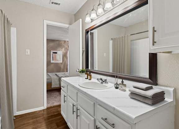 Virtually staged b2 bathroom at Noel on the Parkway in Dallas, TX