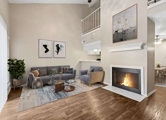 Virtually staged b2 living room at Noel on the Parkway in Dallas, TX