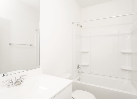 2nd bathroom with a bathtub and a sink at Beacon at Clinton Corners in Dade City, FL